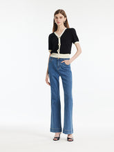 You can wear a knit top with plaid pants.